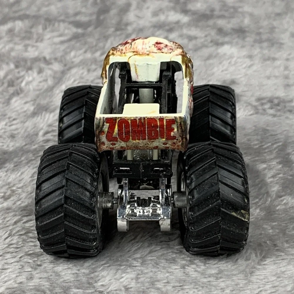 Hot Wheels Monster Trucks lot of 2 Trucks 1:64 Zombie & Wild Thang Preowned